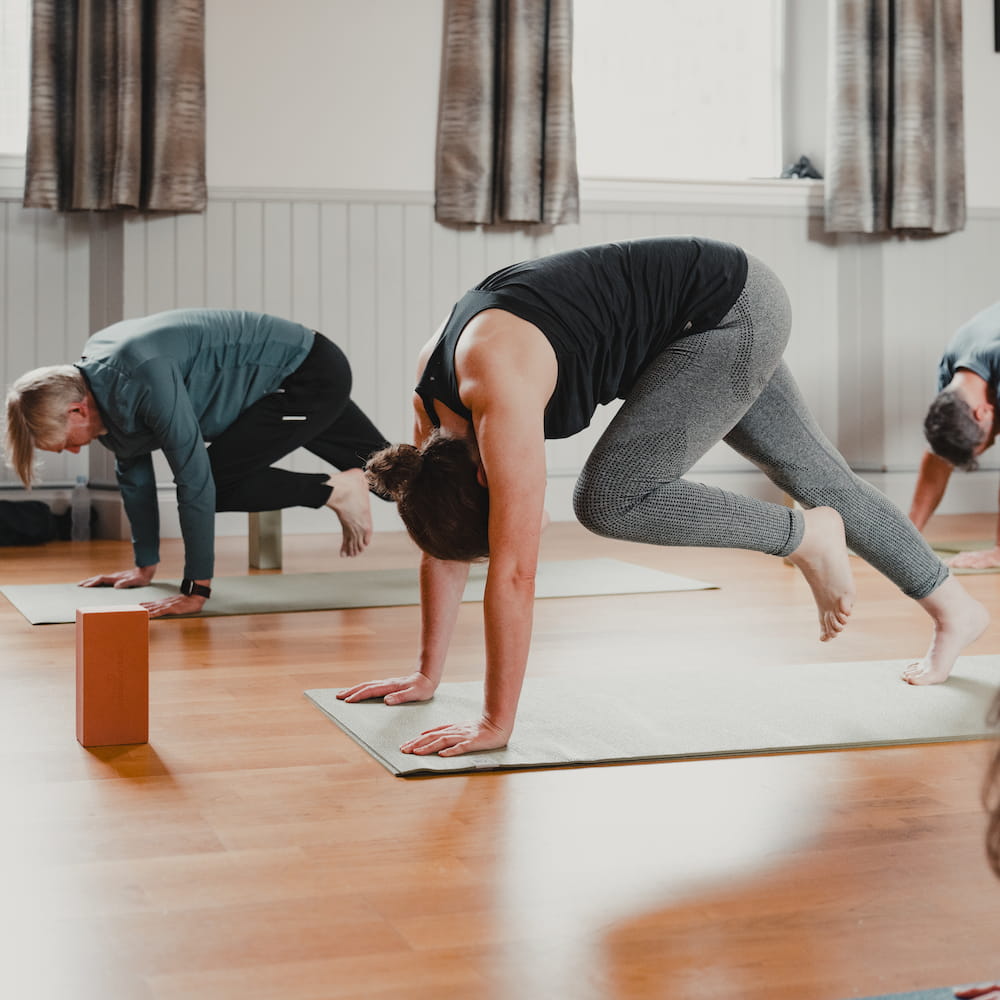 A student holding a pose with concentration and ease.